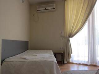 Отель Family Hotel Bistritsa Сандански Двухместный номер с 2 отдельными кроватями и балконом-3